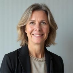 Professional headshot of Dr. Elena Fischer, Lead Speech Coach.